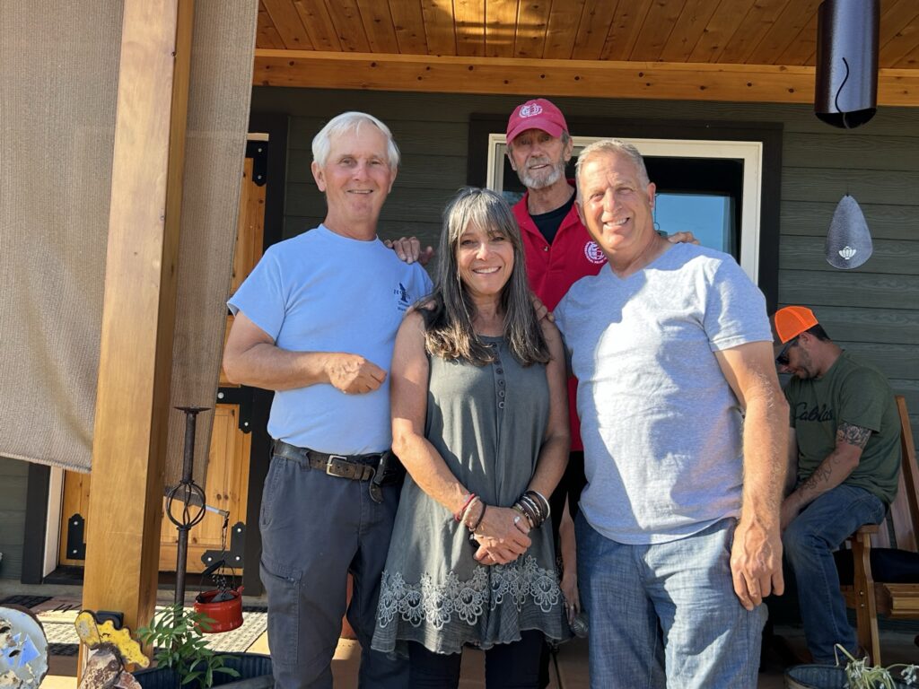 Angie with (L to R) John and Ken from IRT and Mark from HCRN