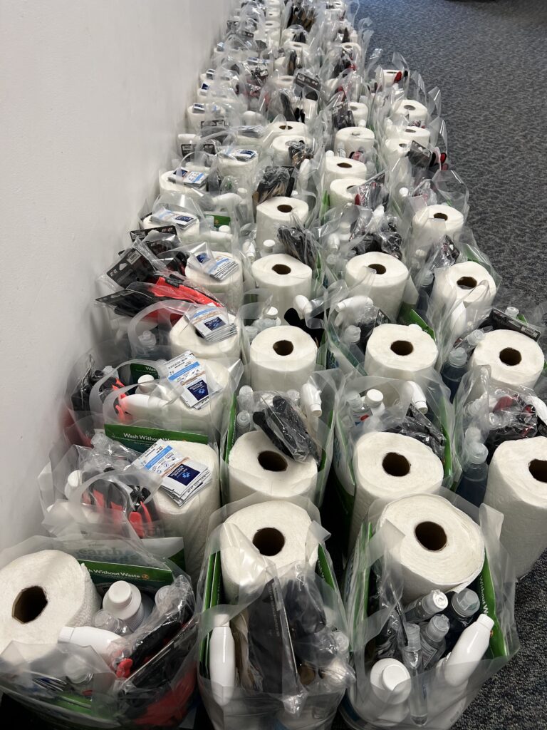 Bags with cleaning supplies for flood survivors to clean their homes.