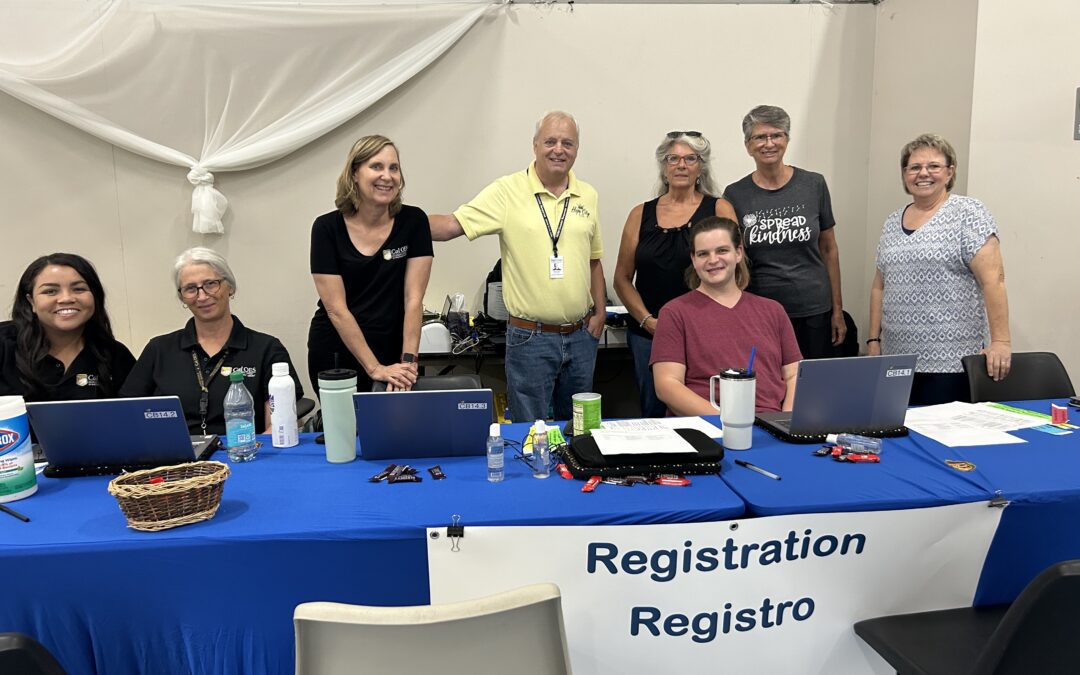 HCRN staff with volunteers, registering disaster survivors for assistance